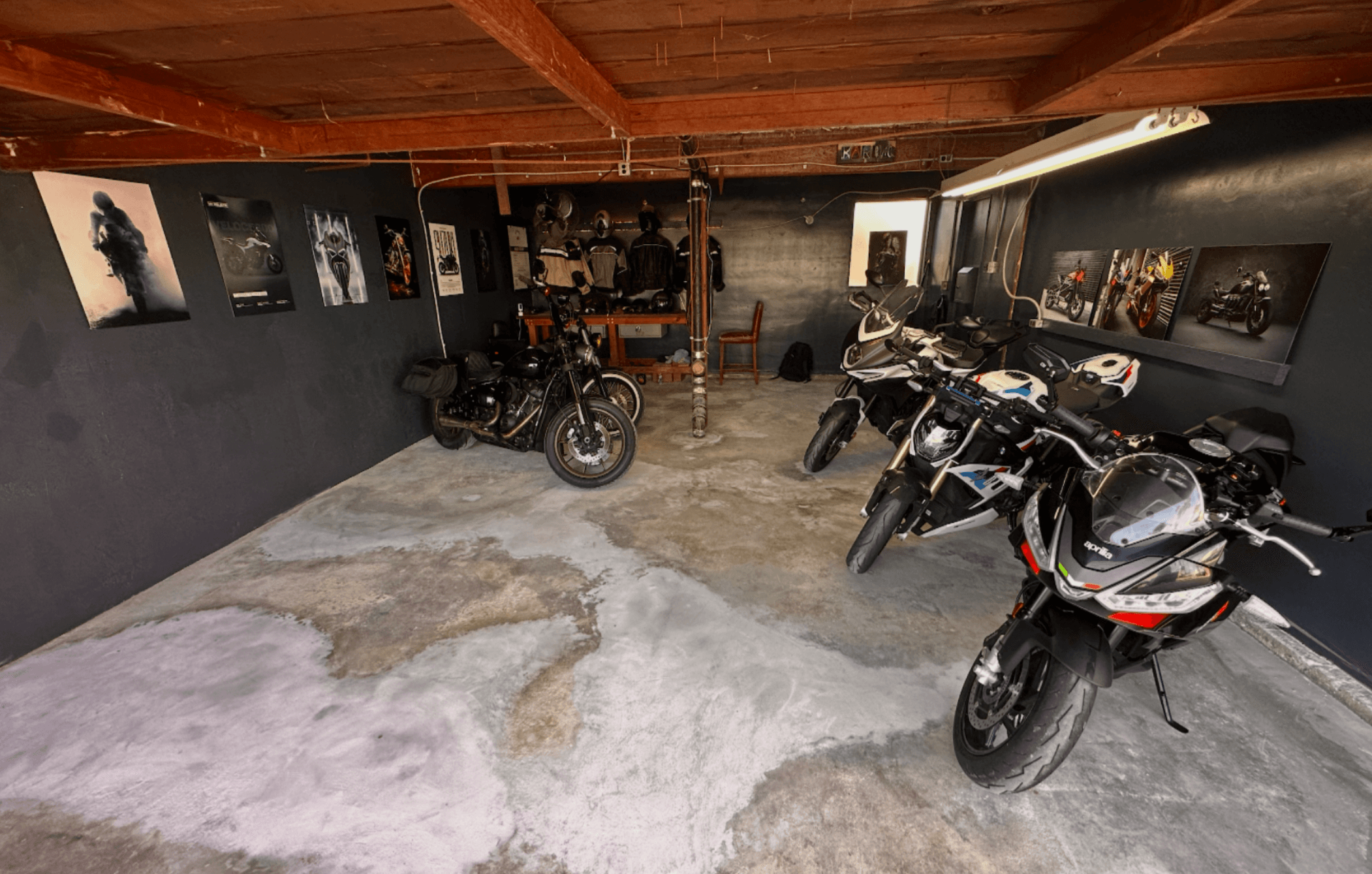 Interior view of Moto Venice secure motorcycle storage garage showing multiple bikes in a clean, organized facility